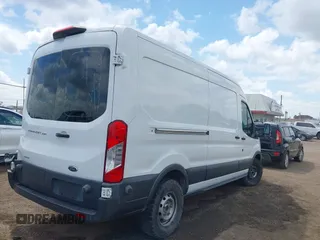 2018 Ford Transit Cargo with VIN 1FTYR2CG9JKA51600, listed as a IAAI auction lot 42026514 with 57,484 mi miles and . Bid and sale history available at DreamBid. Image 4.