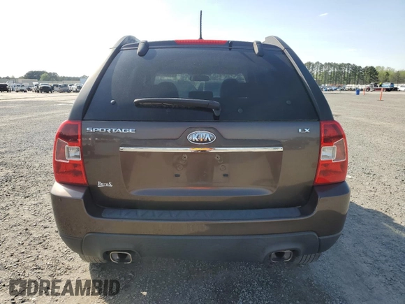 2009 Kia Sportage LX with VIN KNDJF724297573255, listed as a Copart auction lot 51300095 with 199,362 mi miles and Salvage Title. Bid and sale history available at carsss.com. Image 6.