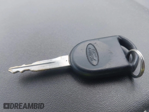 2008 Ford Focus SE with VIN 1FAHP33N58W121614, listed as a IAAI auction lot 42535574 with 156,624 mi miles and . Bid and sale history available at DreamBid. Image 11.