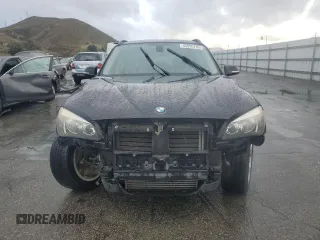 2015 BMW X1 sDrive28i with VIN WBAVM1C55FVW56937, listed as a Copart auction lot 45050785 with 77,736 mi miles and Salvage Title. Bid and sale history available at carsss.com. Image 5.