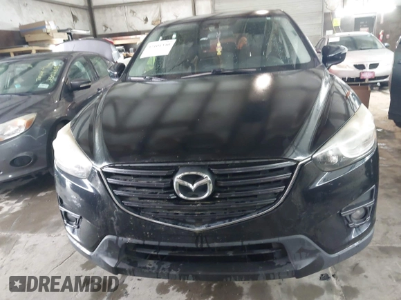 2016 Mazda CX-5 Grand Touring with VIN JM3KE4DY5G0816575, listed as a IAAI auction lot 42101340 with 180,762 mi miles and . Bid and sale history available at carsss.com. Image 12.
