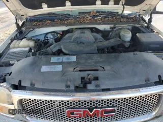 2006 GMC Sierra Denali z VIN 2GTEK63N961143391, wystawiony jako Copart lot #73767264 z przebiegiem Nie podano mil oraz Szkody całkowita. Historia ofert i sprzedaży dostępna na DreamBid. Obrazek 11.