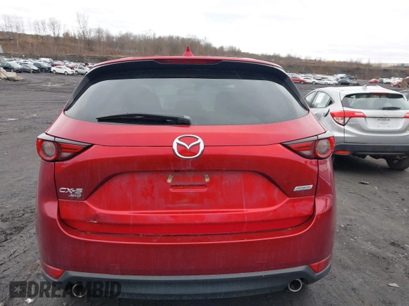 2018 Mazda CX-5 Grand Touring with VIN JM3KFBDM0J0427753, listed as a IAAI auction lot 41740838 with 69,683 mi miles and . Bid and sale history available at DreamBid. Image 16.