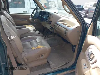 1995 Chevrolet Suburban with VIN 1GNGK26N9SJ397588, listed as a IAAI auction lot 42114009 with 238,914 mi miles. Bid and sale history available at carsss.com. Image 5.