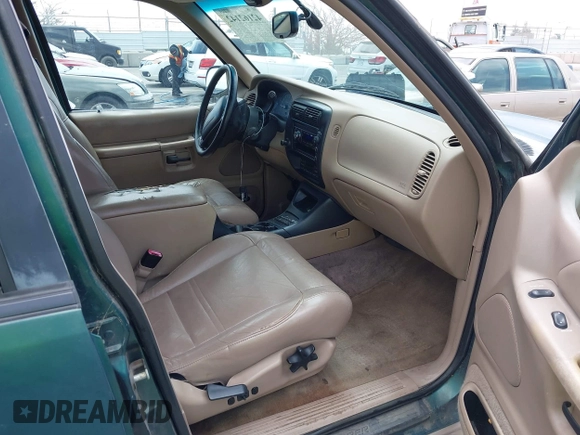 1999 Ford Explorer XLT z VIN 1FMZU32E7XZA43211, wystawiony jako IAAI lot #42162142 z przebiegiem 200 469 mil mil oraz . Historia ofert i sprzedaży dostępna na DreamBid. Obrazek 5.