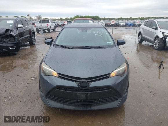 2019 Toyota Corolla L with VIN 5YFBURHE8KP873067, listed as a IAAI auction lot 41936471 with 75,076 mi miles and . Bid and sale history available at carsss.com. Image 12.