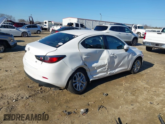 2016 Scion iA z VIN 3MYDLBZV6GY119076, wystawiony jako IAAI lot #41282871 z przebiegiem Nie podano mil oraz . Historia ofert i sprzedaży dostępna na DreamBid. Obrazek 4.