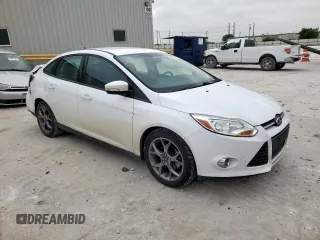 2013 Ford Focus SE z VIN 1FADP3F23DL108047, wystawiony jako Copart lot #57450795 z przebiegiem 67 518 mil mil oraz Szkoda całkowita • Salvage title. Historia ofert i sprzedaży dostępna na DreamBid. Obrazek 4.