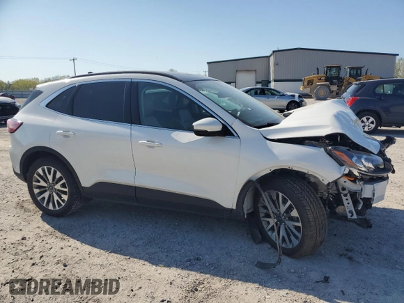 2020 Ford Escape Titanium Hybrid z VIN 1FMCU9DZ4LUC12763, wystawiony jako Copart lot #56589615 z przebiegiem Nie podano mil oraz Szkoda całkowita • Salvage title. Historia ofert i sprzedaży dostępna na DreamBid. Obrazek 4.
