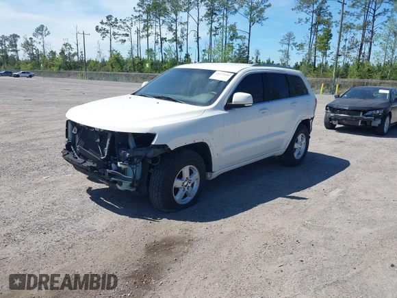 2011 Jeep Grand Cherokee Laredo with VIN 1J4RS4GG0BC573388, listed as a IAAI auction lot 41875998 with Not Provided miles and . Bid and sale history available at DreamBid. Image 2.