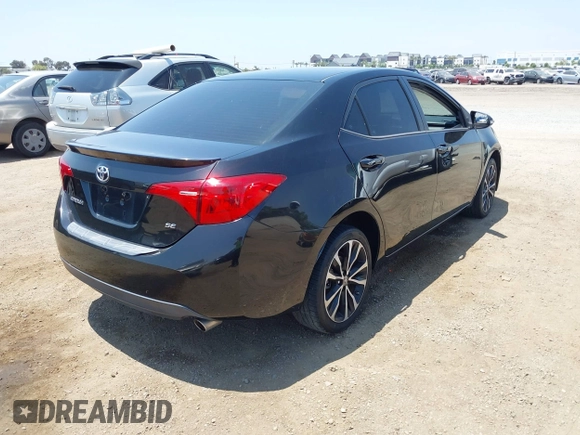 2017 Toyota Corolla L with VIN 5YFBURHE1HP712536, listed as a IAAI auction lot 42592613 with 76,672 mi miles and . Bid and sale history available at DreamBid. Image 4.