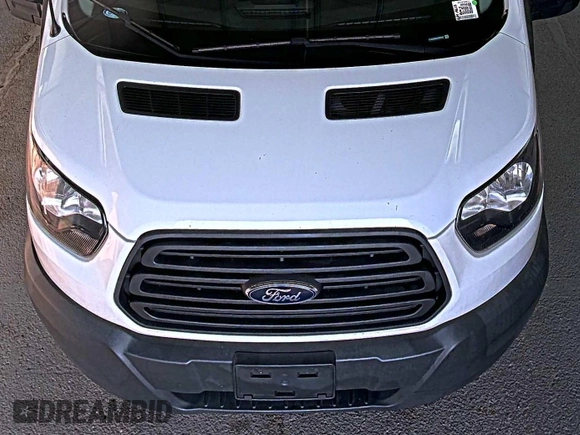 2018 Ford Transit with VIN 1FTBW2ZM8JKA77066, listed as a IAAI auction lot 42642396 with 215,234 mi miles and . Bid and sale history available at DreamBid. Image 19.