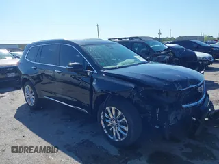 2020 Cadillac XT6 FWD Premium Luxury z VIN 1GYKPERS0LZ232338, wystawiony jako IAAI lot #41845562 z przebiegiem 86 839 mil mil oraz . Historia ofert i sprzedaży dostępna na DreamBid. Obrazek 1.
