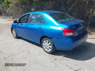 2009 Toyota Yaris with VIN JTDBT903091345311, listed as a IAAI auction lot 40269675 with 156,874 mi miles. Bid and sale history available at carsss.com. Image 3.