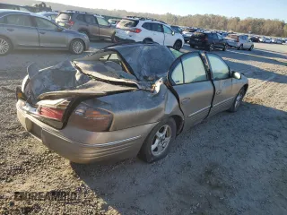 2001 Pontiac Bonneville SE z VIN 1G2HX54K314206208, wystawiony jako Copart lot #75285534 z przebiegiem Nie podano mil oraz Szkoda całkowita • Salvage title. Historia ofert i sprzedaży dostępna na DreamBid. Obrazek 3.