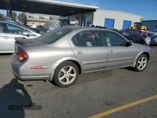 2001 Nissan Maxima SE 20th Anniversary. z VIN JN1CA31A91T314977, wystawiony jako Copart lot #75260034 z przebiegiem 178 471 mil mil oraz Szkoda całkowita • Salvage title. Historia ofert i sprzedaży dostępna na DreamBid. Obrazek 3.