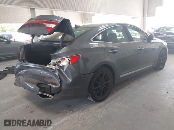 2013 Hyundai Azera with VIN KMHFH4JG3DA213459, listed as a IAAI auction lot 42642239 with 130,195 mi miles and . Bid and sale history available at DreamBid. Image 4.