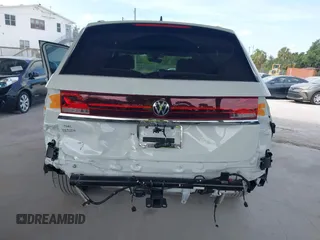 2024 Volkswagen Atlas SE z VIN 1V2JR2CA1RC616729, wystawiony jako IAAI lot #42049460 z przebiegiem 3 718 mil mil oraz . Historia ofert i sprzedaży dostępna na DreamBid. Obrazek 6.