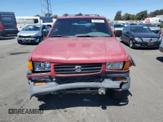 1996 Honda Passport z VIN 4S6CM58V7T4414553, wystawiony jako Copart lot #68566814 z przebiegiem 152 954 mil mil oraz Szkody całkowita. Historia ofert i sprzedaży dostępna na DreamBid. Obrazek 5.