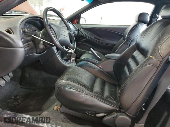 1997 Ford Mustang GT with VIN 1FALP42X3VF130827, listed as a Copart auction lot 60529995 with 112,799 mi miles and Salvage title. Bid and sale history available at DreamBid. Image 7.