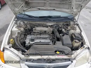2000 Mazda Protege DX with VIN JM1BJ2220Y0273953, listed as a IAAI auction lot 41956058 with 158,837 mi miles and . Bid and sale history available at DreamBid. Image 10.