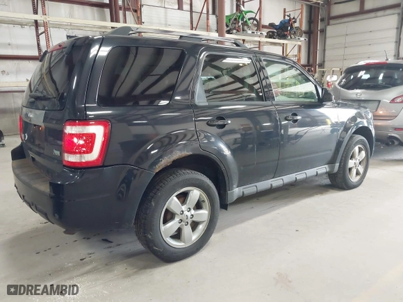 2011 Ford Escape Limited with VIN 1FMCU0EG0BKB30015, listed as a IAAI auction lot 41987953 with 203,057 mi miles. Bid and sale history available at carsss.com. Image 4.