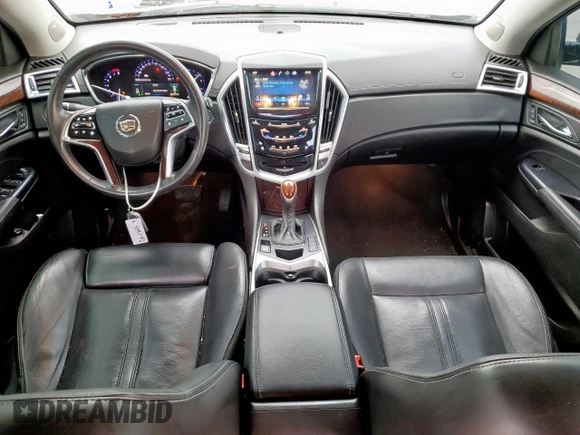 2015 Cadillac SRX Premium Collection z VIN 3GYFNDE33FS574125, wystawiony jako Copart lot #55530575 z przebiegiem 76 956 mil mil oraz Szkoda całkowita • Salvage title. Historia ofert i sprzedaży dostępna na DreamBid. Obrazek 8.