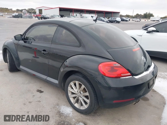 2013 Volkswagen Beetle Entry with VIN 3VWFP7AT8DM644840, listed as a IAAI auction lot 41387843 with 195,597 mi miles and . Bid and sale history available at DreamBid. Image 3.