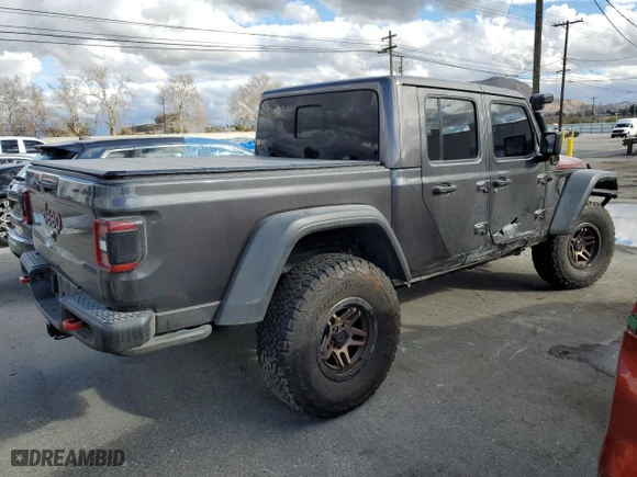 2021 Jeep Gladiator Rubicon with VIN 1C6JJTBG9ML512347, listed as a Copart auction lot 43197415 with 134,608 mi miles and Salvage Title. Bid and sale history available at carsss.com. Image 3.