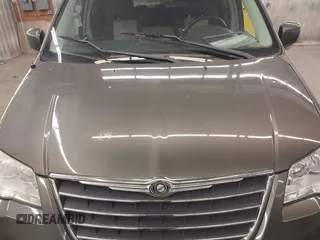 2010 Chrysler Town & Country Touring Plus with VIN 2A4RR8D17AR393916, listed as a IAAI auction lot 42171114 with 123,741 mi miles. Bid and sale history available at carsss.com. Image 6.