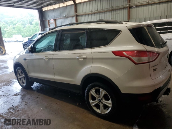 2013 Ford Escape SE z VIN 1FMCU9G96DUC02216, wystawiony jako Copart lot #63431115 z przebiegiem 186 614 mil mil oraz Szkoda całkowita • Salvage title. Historia ofert i sprzedaży dostępna na DreamBid. Obrazek 2.
