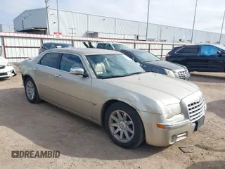 2006 Chrysler 300 C with VIN 2C3KA63HX6H487887, listed as a IAAI auction lot 41603068 with 133,169 mi miles. Bid and sale history available at carsss.com. Image 1.