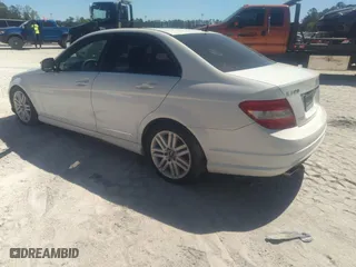 2009 Mercedes-Benz C-Class 3.0L Sport with VIN WDDGF54X59R056788, listed as a IAAI auction lot 42050204 with 213,706 mi miles. Bid and sale history available at carsss.com. Image 3.