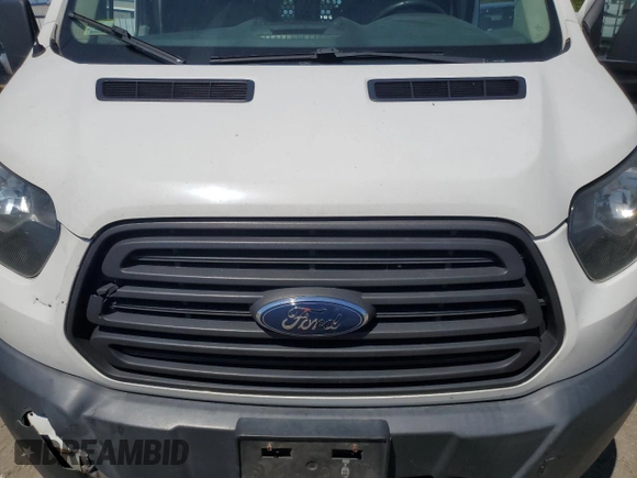 2015 Ford Transit Cargo z VIN 1FTNR1ZM1FKB05215, wystawiony jako Copart lot #62349495 z przebiegiem 154 057 mil mil oraz Czysty tytuł • Clean title. Historia ofert i sprzedaży dostępna na DreamBid. Obrazek 11.