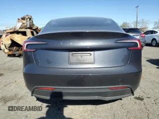 2025 Tesla Model 3 Long Range with VIN 5YJ3E1EA1SF878806, listed as a Copart auction lot 50427005 with 9,790 mi miles and Salvage Title. Bid and sale history available at DreamBid. Image 6.