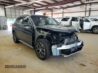2021 BMW X1 xDrive28i with VIN WBXJG9C00M5S35249, listed as a Copart auction lot 61895775 with 34,641 mi miles and Salvage title. Bid and sale history available at DreamBid. Image 14.