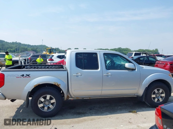 2011 Nissan Frontier Pro-4X с VIN 1N6AD0EV0BC415542, выставлен на аукционе IAAI как лот 42455036 с пробегом 153 099 миль миль и . История ставок и продаж доступна на DreamBid. Изображение 13.
