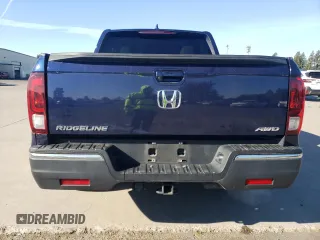 2017 Honda Ridgeline RTL-T with VIN 5FPYK3F63HB008494, listed as a Copart auction lot 55640195 with 91,131 mi miles and Salvage title. Bid and sale history available at DreamBid. Image 6.