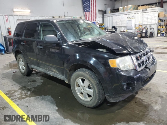 2011 Ford Escape XLS z VIN 1FMCU9C77BKC43662, wystawiony jako Copart lot #51779335 z przebiegiem 104 548 mil mil oraz Szkoda całkowita • Salvage title. Historia ofert i sprzedaży dostępna na DreamBid. Obrazek 4.
