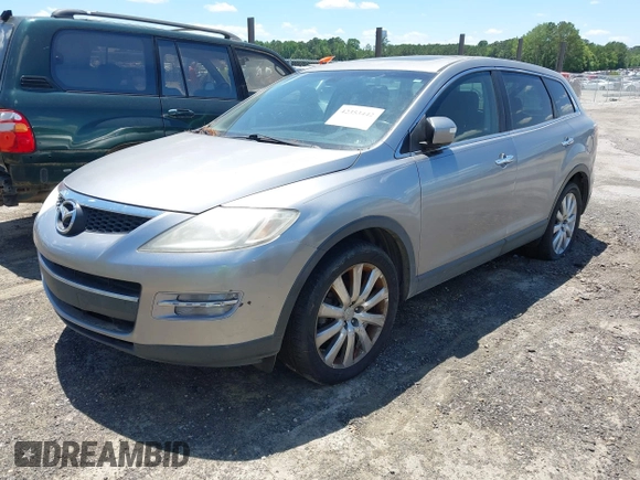 2009 Mazda CX-9 Touring z VIN JM3TB28A990179949, wystawiony jako IAAI lot #42353442 z przebiegiem 257 378 mil mil oraz . Historia ofert i sprzedaży dostępna na DreamBid. Obrazek 2.