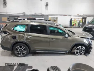 2023 Subaru Ascent Touring z VIN 4S4WMAWD7P3411589, wystawiony jako IAAI lot #42096301 z przebiegiem 41 811 mil mil oraz . Historia ofert i sprzedaży dostępna na DreamBid. Obrazek 13.