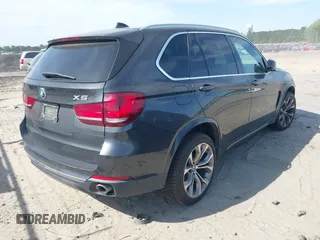 2014 BMW X5 xDrive35d with VIN 5UXKS4C57E0J93982, listed as a IAAI auction lot 42085173 with 169,908 mi miles. Bid and sale history available at carsss.com. Image 4.