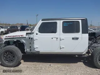 2023 Jeep Gladiator Mojave with VIN 1C6JJTEG0PL536472, listed as a IAAI auction lot 41621934 with 24,245 mi miles. Bid and sale history available at carsss.com. Image 14.