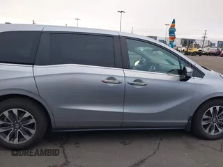 2022 Honda Odyssey EX-L with VIN 5FNRL6H77NB041754, listed as a IAAI auction lot 41791425 with 15,306 mi miles and . Bid and sale history available at DreamBid. Image 14.