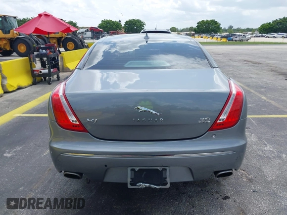 2013 Jaguar XJ with VIN SAJWJ1CD4D8V46305, listed as a IAAI auction lot 42637329 with 101,532 mi miles and . Bid and sale history available at DreamBid. Image 16.