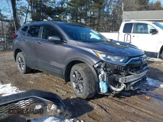 2020 Honda CR-V EX with VIN 2HKRW2H59LH606857, listed as a IAAI auction lot 41617011 with 68,850 mi miles. Bid and sale history available at carsss.com. Image 1.