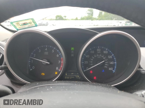 2012 Mazda 3 i Touring with VIN JM1BL1V82C1577583, listed as a Copart auction lot 58669235 with 89,872 mi miles and Salvage title. Bid and sale history available at DreamBid. Image 9.