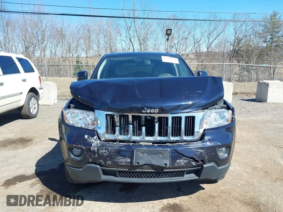 2011 Jeep Grand Cherokee Laredo with VIN 1J4RR4GG3BC670712, listed as a IAAI auction lot 41738127 with 93,714 mi miles and . Bid and sale history available at DreamBid. Image 12.