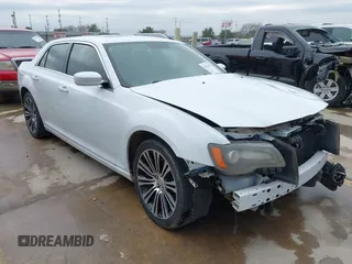 2013 Chrysler 300 with VIN 2C3CCABGXDH735739, listed as a IAAI auction lot 41282492 with 121,487 mi miles. Bid and sale history available at carsss.com. Image 1.