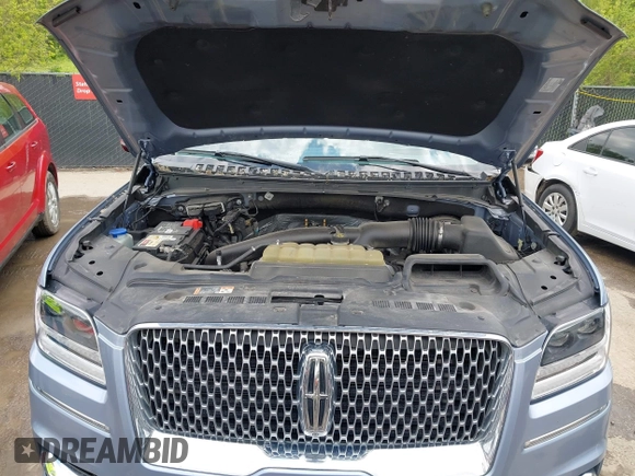 2021 Lincoln Navigator Black Label z VIN 5LMJJ3TT9MEL04485, wystawiony jako IAAI lot #42076087 z przebiegiem 69 704 mil mil oraz . Historia ofert i sprzedaży dostępna na DreamBid. Obrazek 10.